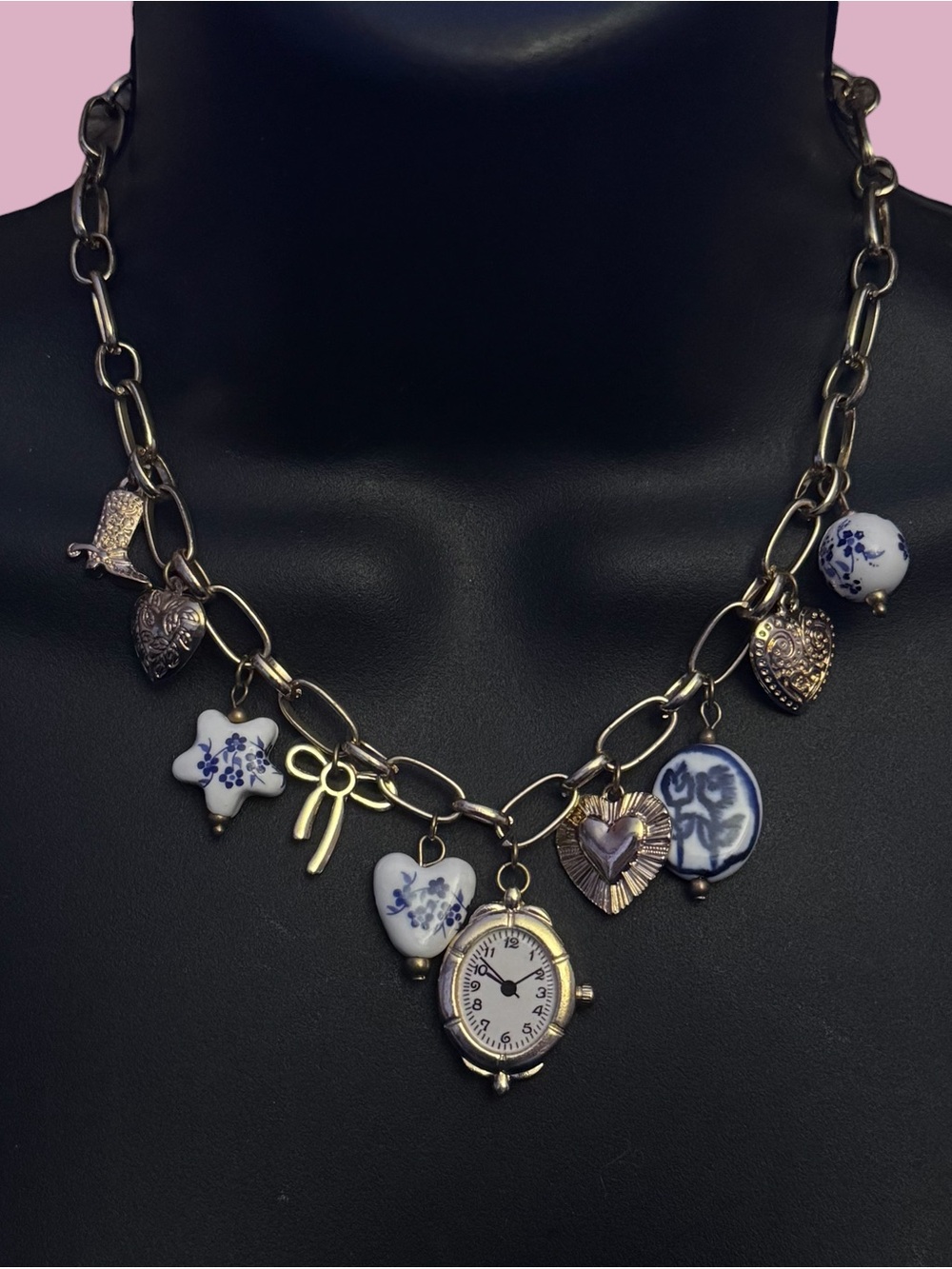 Gold tone porcelain charm necklace
